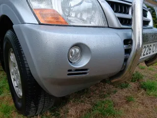 Defensa mitsubishi montero con Faros y mataburros