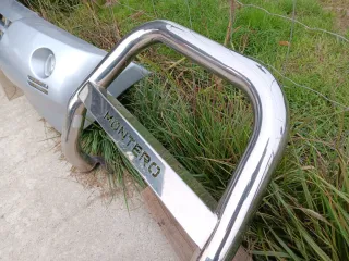 Defensa mitsubishi montero con Faros y mataburros