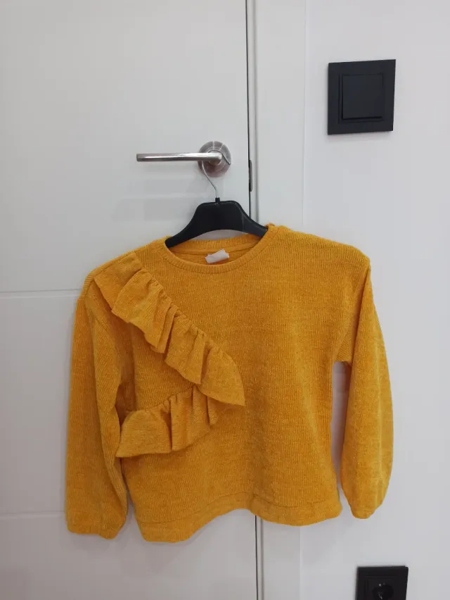 Jersey niña amarillo con volantes. Talla 9-10 años