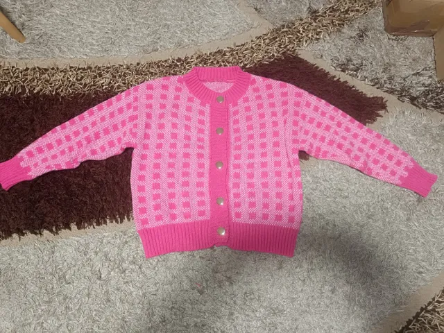 Jersey rosa de punto con botones