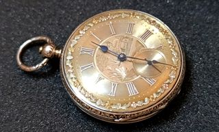 Reloj de bolsillo antiguo circa 1830