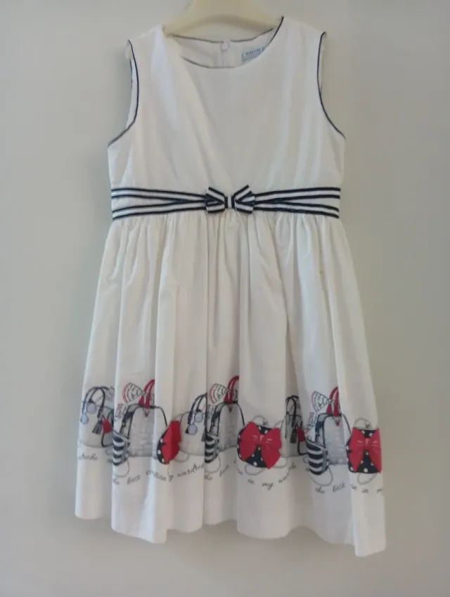 Vestido blanco niña con bolsos