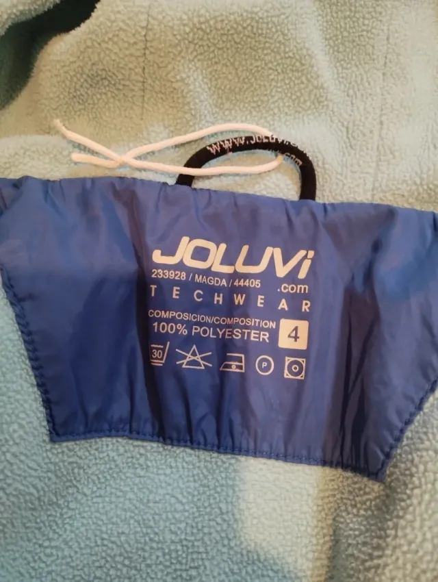 Chaqueta azul acolchada unisex con capucha