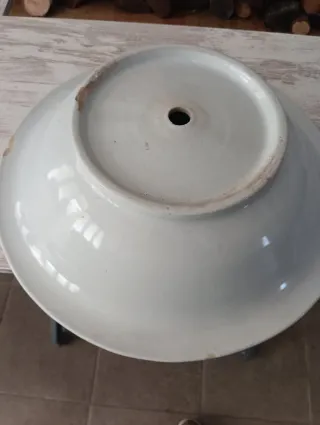 Pica redonda antigua de ceramica