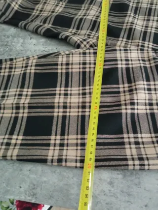 Pantaloni donna fantasia a quadri beige e neri