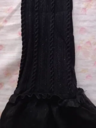 Medias sin estrenar por encima de la rodilla 