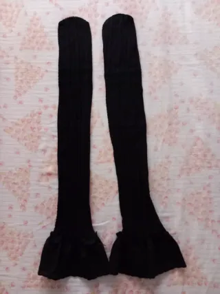 Medias sin estrenar por encima de la rodilla 