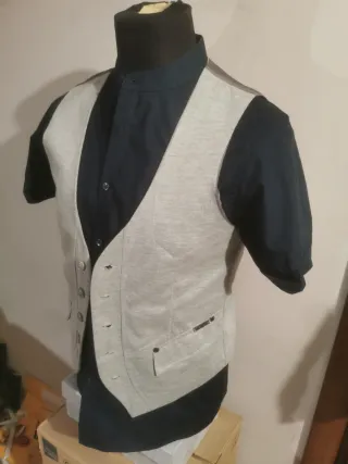 Gilet uomo grigio
Smanicato panciotto in maglia