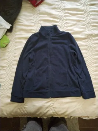 Polar azul marino con cremallera y bolsillos