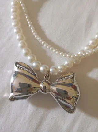 Collana perle con ciondolo fiocco