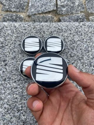 Tapabujes Seat 56mm Negro Plata nuevos
