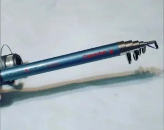 Caña de pescar con carrete