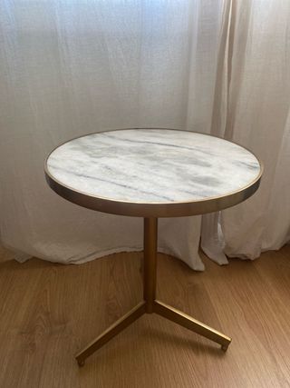 Mesa auxiliar mármol y metal dorado Zara Home