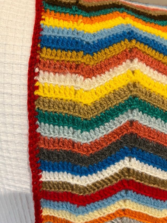 Manta de punto de lana cosida a mano multicolor