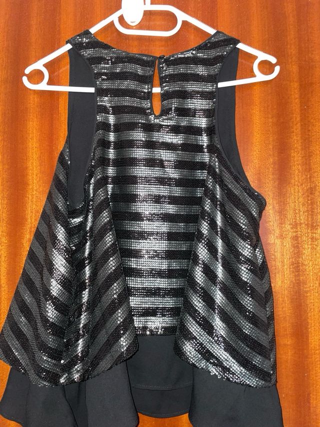Blusa lentejuelas negra y plateada