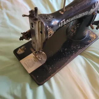 Máquina de coser antigua Naumann