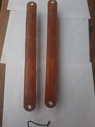 Porta rifles de cuero. Soporte de pared