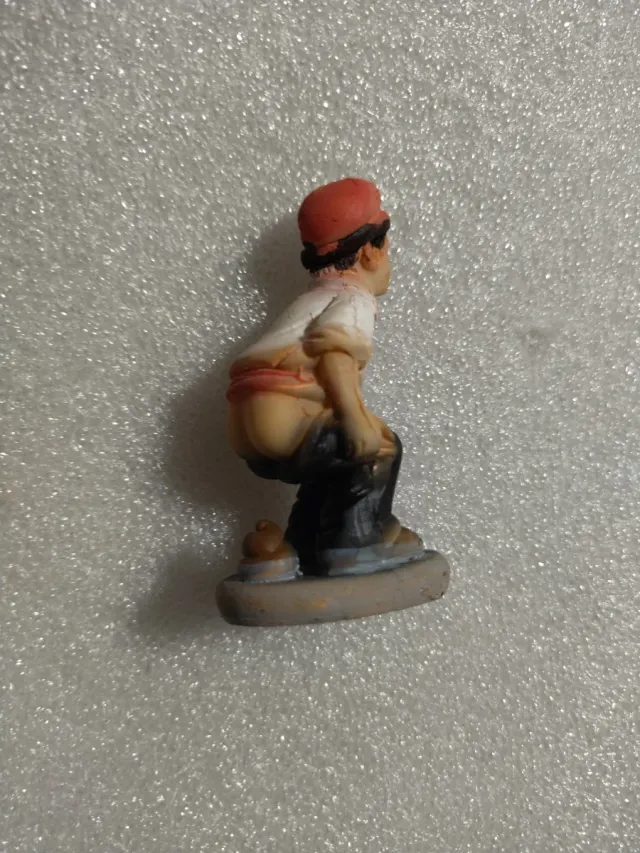Caganer souvenir Spagna Ragazzo che la sta facendo