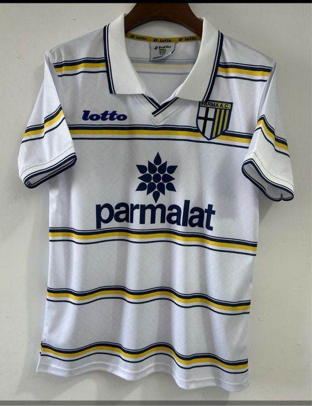 Camiseta Lotto Parma A.C. blanca y amarilla