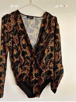 Conjunto pantalón y body estampado