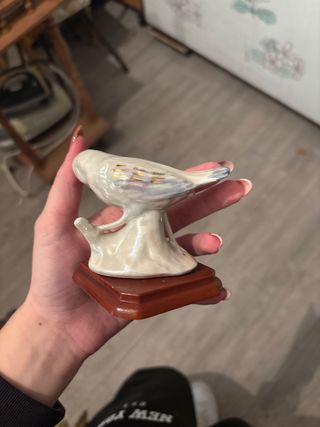 Decoração de pássaro em cerâmica