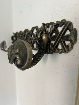 Appendiabiti da parete in metallo