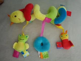 Juguete espiral para cochecito de bebé
