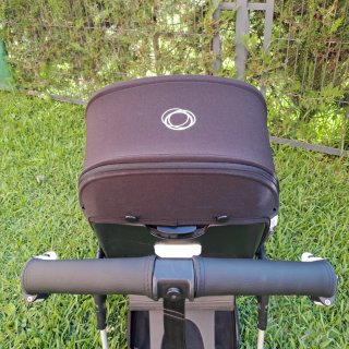 Bugaboo Bee5, capotas rosa y negra y colchoneta