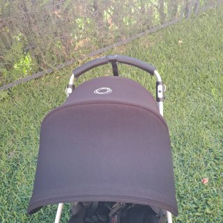 Bugaboo Bee5, capotas rosa y negra y colchoneta