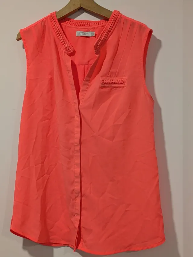 Blusa Cortefiel coral sin mangas