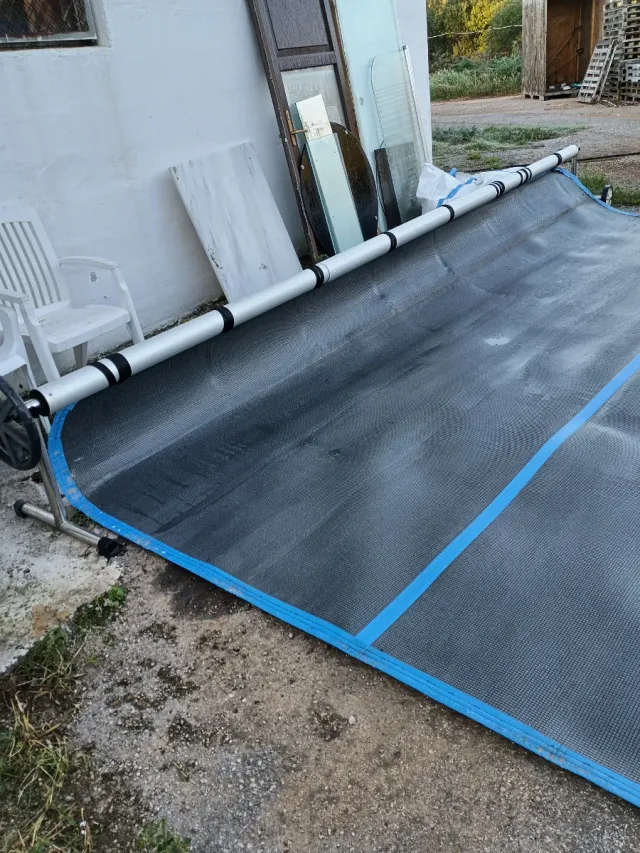 Toldo para piscina enrollable..