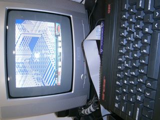 ZX Spectrum +2 con disketera externa y juegos