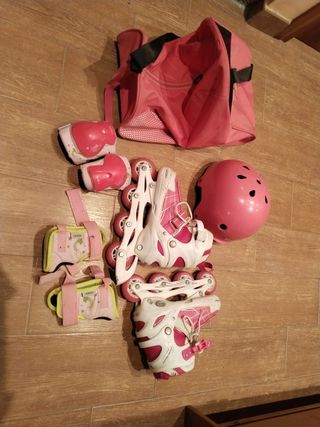 Patines en línea rosas y blancos talla de 34 a 37.