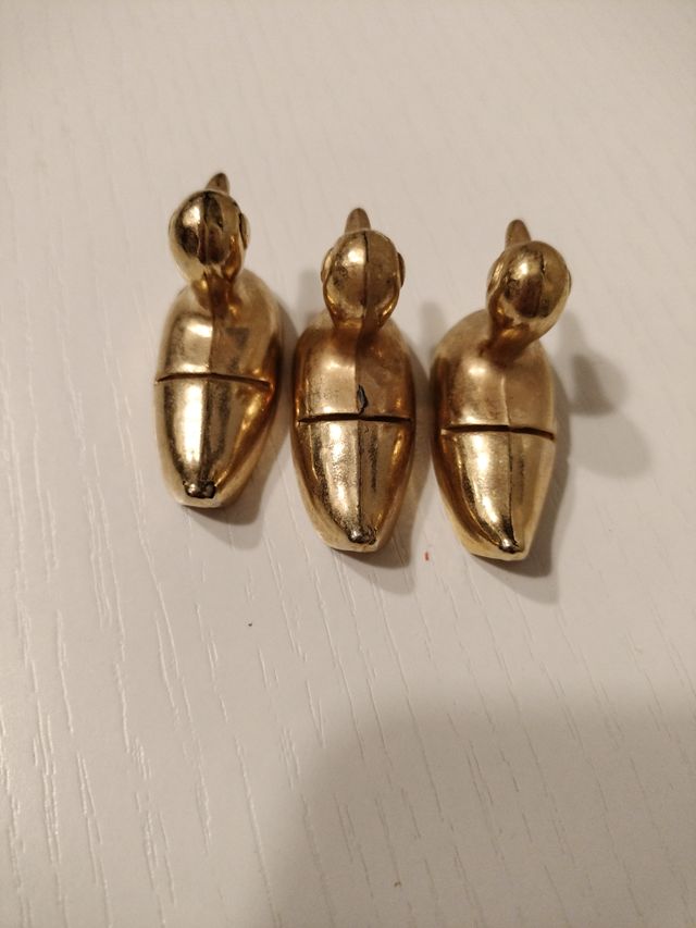 Tre segnaposti in ottone