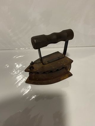 Plancha antigua de hierro fundido