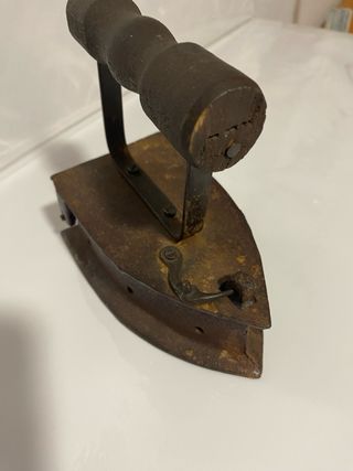 Plancha antigua de hierro fundido