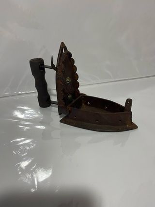 Plancha antigua de hierro fundido