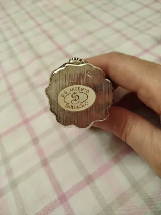 Angioletto in argento con fiori colorati