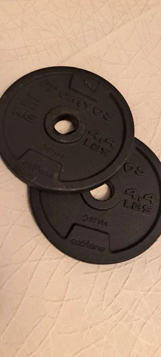 2 discos 2 kg de pesa DOMYOS 4 kg