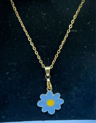 Collana con ciondolo fiore blu e oro