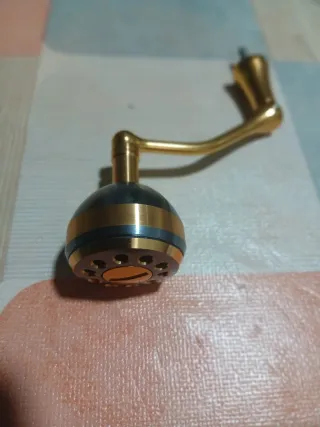 Manivela dorada carrete pesca