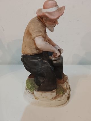 Figura cerámica antigua herrero