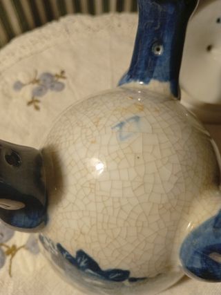 Antico portacandele in porcellana blu e bianca