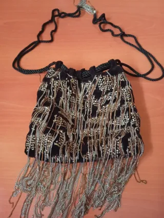 Bolso de fiesta elegante negro y dorado