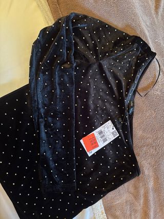 Top asimétrico con pedrería