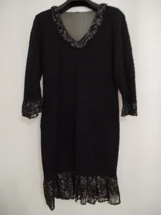 Abito nero con pizzo