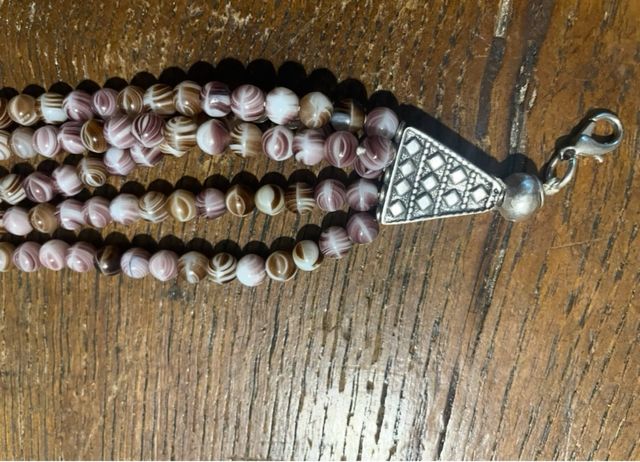 Braccialetto 5 fili pietre viola