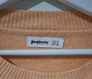 Jersey naranja pastel de punto