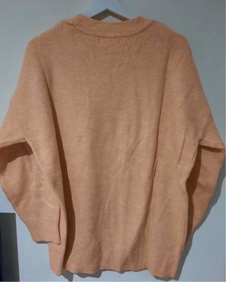 Jersey naranja pastel de punto