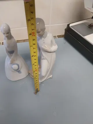 Pareja figuras porcelana con perro